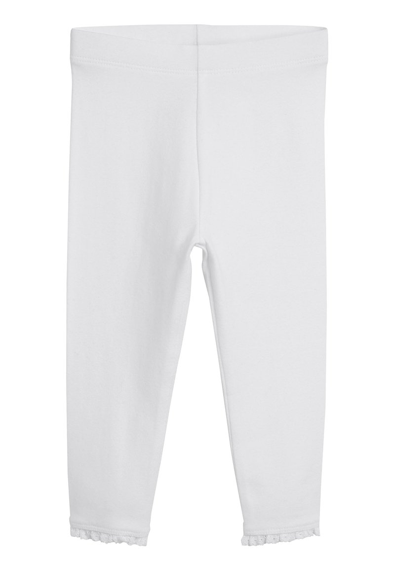 Witte katoenen legging met een soepele textuur, voorzien van een gerimpelde zoom bij de enkel, ontworpen voor comfort en draaggemak.