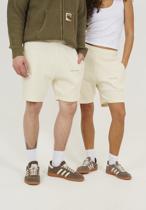 UNISEX - Tracksuit bottoms - ivory