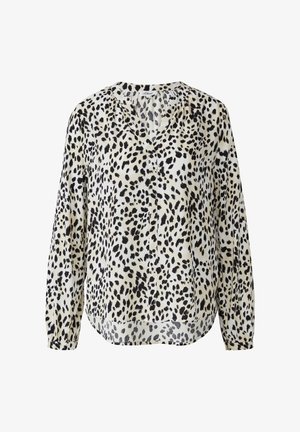 Pikad varrukad, kerge ja läbipaistev bluus, millel on kreemjas alus ja mustad leopardikohad. Omab V-kaelust ja lõdva istuvust.