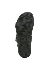 Sandale noire avec une semelle en caoutchouc texturé à motif ondulé, des sangles synthétiques douces et des fermetures ajustables. Nom de la marque "VIONIC" visible.