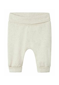 Helle beigefarbene Baby-Sweatpants aus weichem Material, mit einem gerippten Bund und Bündchen an den Knöcheln. Ohne Muster oder zusätzliche Verzierungen.