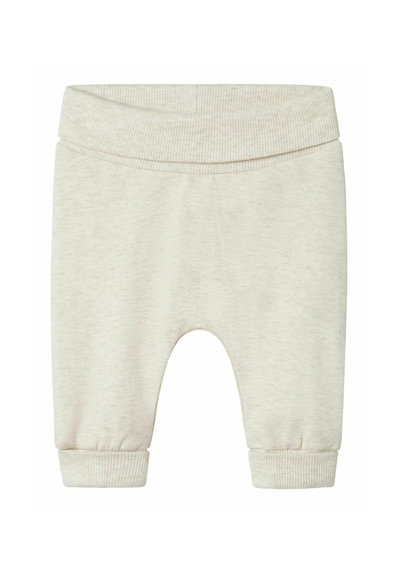 Helle beigefarbene Baby-Sweatpants aus weichem Material, mit einem gerippten Bund und Bündchen an den Knöcheln. Ohne Muster oder zusätzliche Verzierungen.
