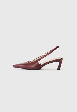 Burgundy slingback heels with a pointed toe, cutout details on the side, and a mid-height block heel. Smooth leather finish.