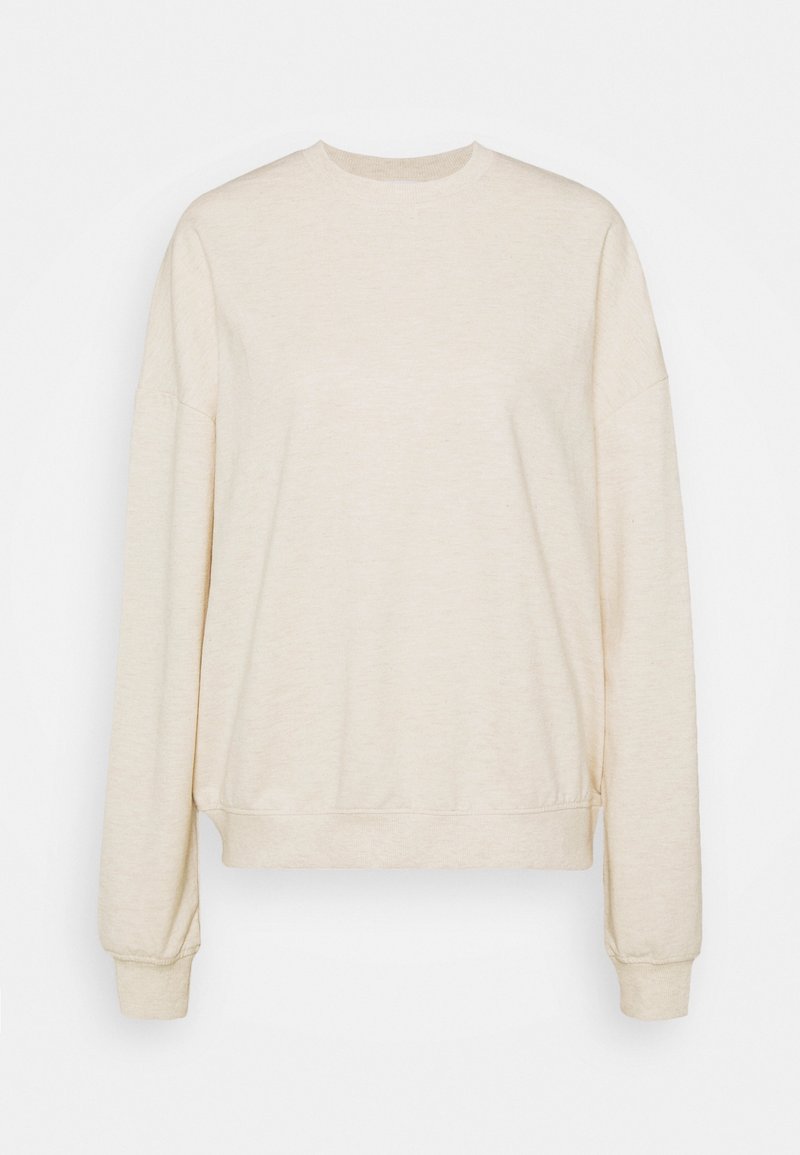 Sudadera beige clara con cuello redondo, mangas largas y puños acanalados; hecha de una suave tela texturizada con un ajuste relajado.