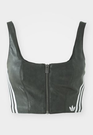 Black cropped top with a front zipper, made of a smooth material. Features three white vertical stripes on each side and an embroidered logo.