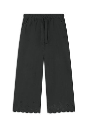Pantaloni neri a gamba larga con vita elastica e dettagli con coulisse, caratterizzati da un orlo ondulato e motivi floreali tagliati al laser.