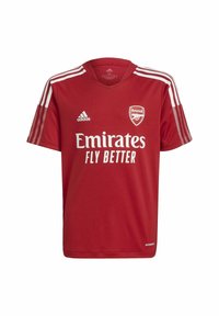 Camiseta roja del Arsenal de Adidas con franjas blancas en las mangas, logo del patrocinador Emirates Fly Better y escudo del club en el pecho.