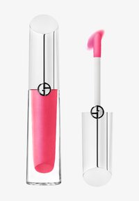 Brillo labial rosa en un tubo transparente con una tapa plateada y un logo negro. Incluye un aplicador blanco con una punta rosa. Textura suave y acabado brillante.
