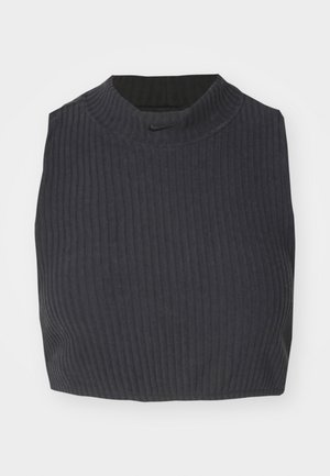 Top cropped com textura em azul escuro, apresentando um decote alto e um discreto logo da Nike. O tecido tem uma aparência texturizada e elástica.