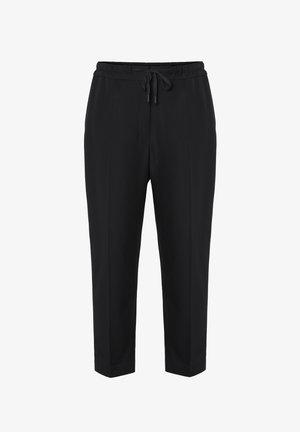 Mustad kitsad püksid siledast kangast, millel on elastne vöökoht kinnituspaelaga, küljetaskud ja vabalt liikuv lõige.