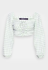 Top cropped em padrão gingham verde e branco com mangas bufantes longas, frente plissada e detalhes de cordão. O tecido é leve e texturizado.
