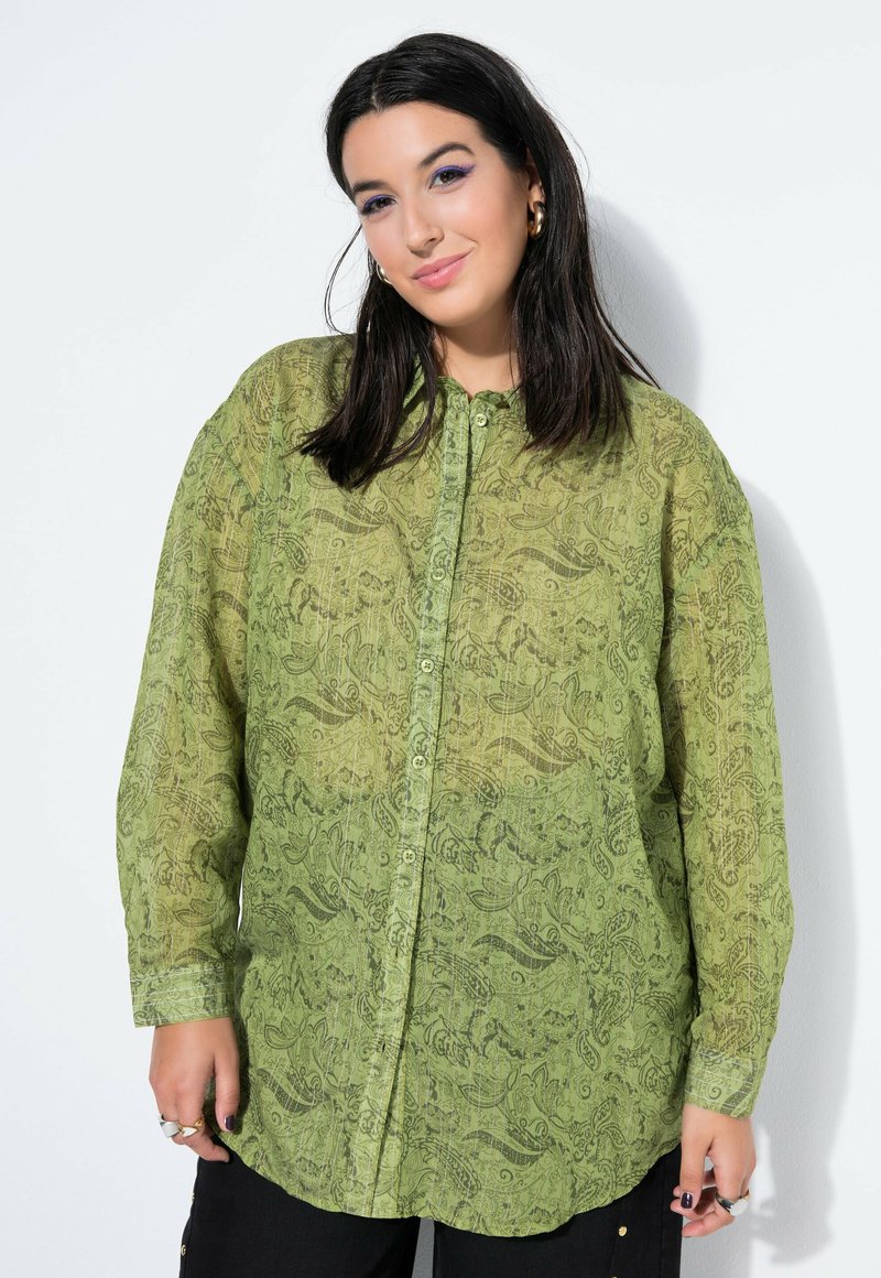 Groen shirt met patroon in lichtgewicht, semi-transparante stof; voorzien van een knoopsluiting aan de voorkant, een losse pasvorm en lange mouwen met manchetten.