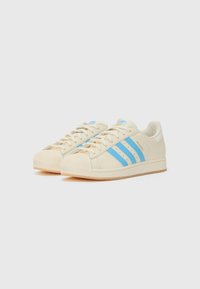 adidas Originals SUPERSTAR MESSI UNISEX - Indoor football boots - cream white/semi blue burst/gold-coloured