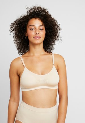 MAGIC Bodyfashion COMFORT BRA SPAGHETTI STRAPS - Hosszított melltartó - skin