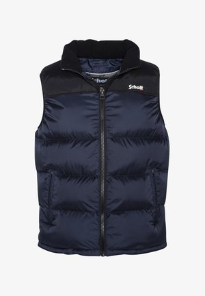 Chaleco acolchado azul marino con cuello alto, cierre frontal y bolsillos laterales. La sección superior presenta tela negra. Logotipo de la marca en el lado izquierdo del pecho.