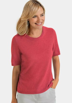 Kurzärmliger Pullover mit Rundhalsausschnitt aus weichem pinken Stoff. Hat einen gerippten Ausschnitt und Säume, eine subtile Textur und eine lässige Passform.