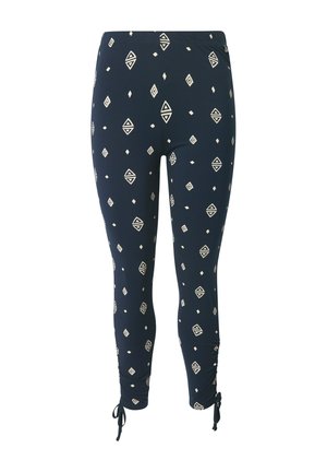 Marinefarbene Leggings aus elastischem Material mit weißen geometrischen Mustern. Besondere Merkmale sind die gerafften Bündchen mit Bindebändern an den Knöcheln für eine verstellbare Passform.