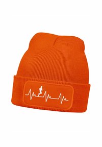 Orange knit beanie featuring a horizontal badge with white heartbeat pattern and a running figure, made from soft textured fabric.