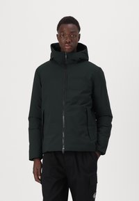 Dark green puffer jacket with a hood, featuring a front zipper and side pockets. Made of smooth, insulated material with a clean design.