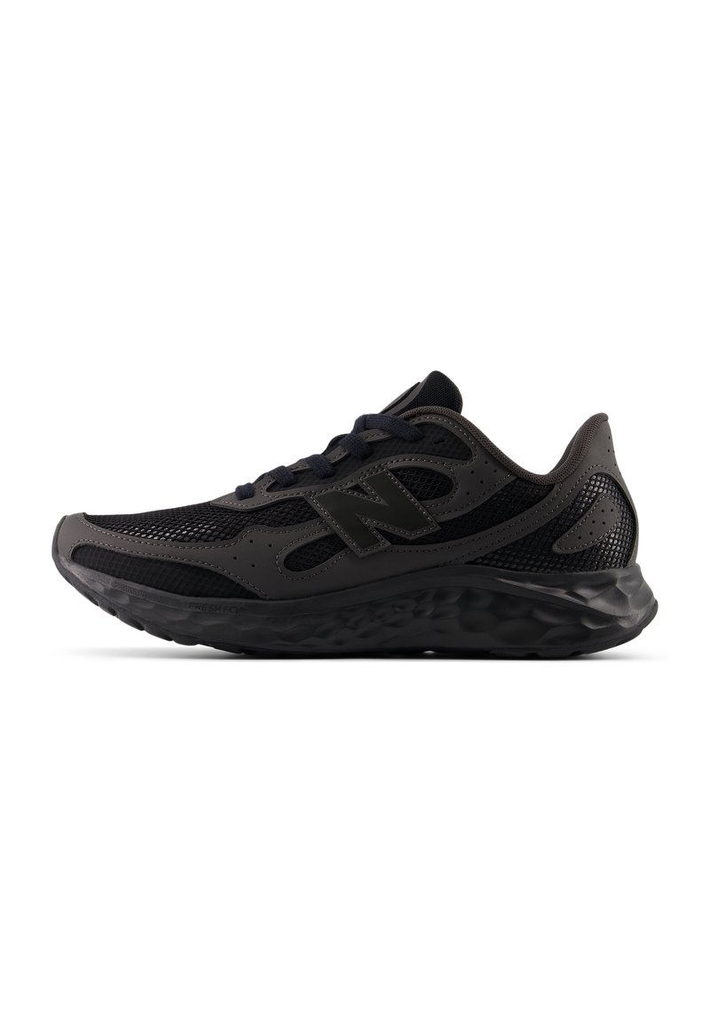 Black athletic shoe with mesh upper, synthetic overlays, lace fastening, and textured sole. Features a prominent logo on the side.