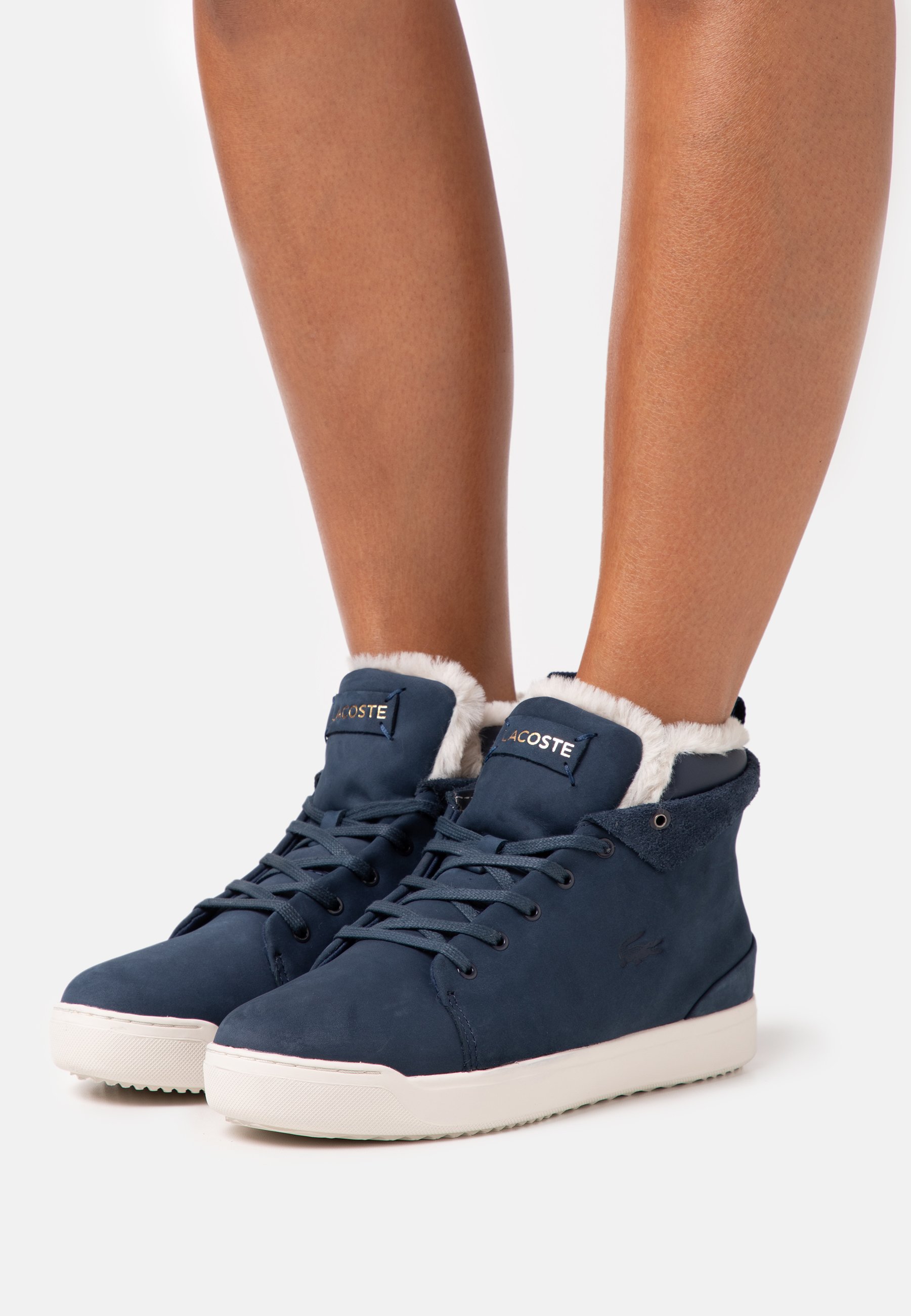 lacoste explorateur white