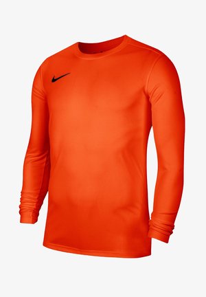 Maillot de sport orange vif à manches longues avec col rond et petit logo noir Nike swoosh sur le côté droit de la poitrine.
