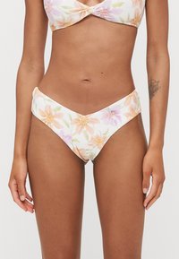 Floral bikini set featuring a ribbed texture. The top has a knotted design, and the bottoms are high-waisted with a V-shape, adorned with pastel flowers.