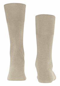 Calze di cotone beige con fascia superiore a coste, texture liscia e design classico di lunghezza media. Adatte a diverse occasioni.