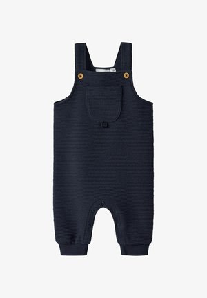 Marineblå babyromper med tekstur, skulderstropper, frontlomme med klaff, treknapper og trykknapper langs skrittet og bena.