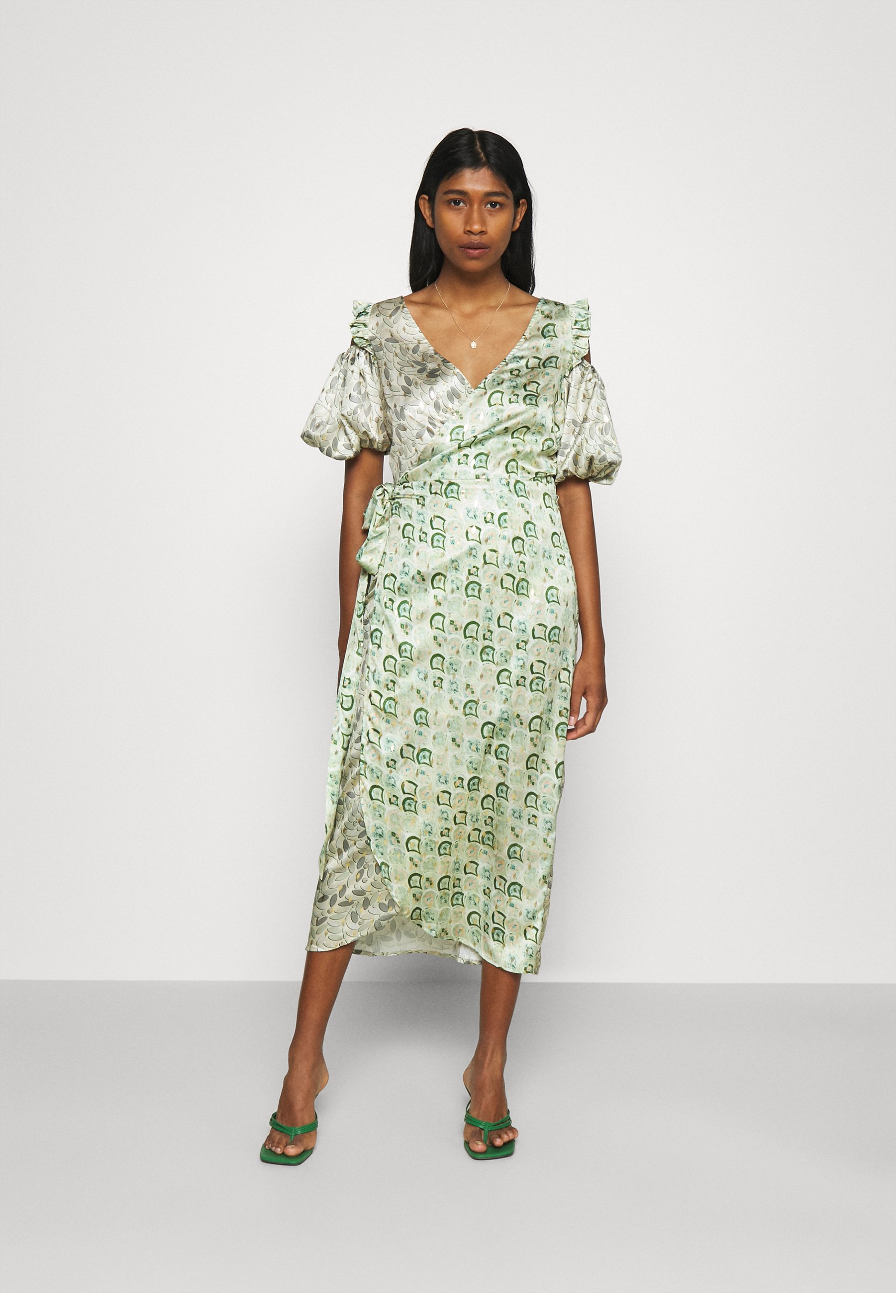 green cold shoulder dress