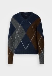Pull bleu marine col en V avec motif losanges argyle marron et gris, manches et bas en côtes.