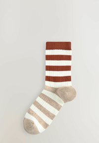 Striped sock featuring alternating brown and cream stripes with beige accents, ribbed top, and a reinforced toe area.