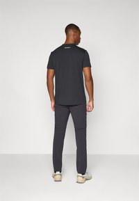Mammut RUNBOLD ZIP OFF PANTS MEN - Hlače za na prostem - black