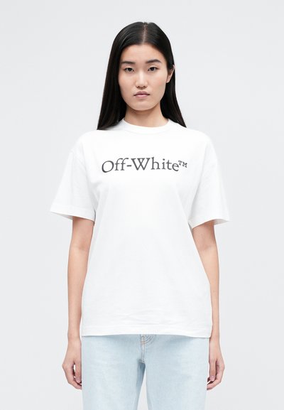 Valge puuvillane T-särk lühikeste varrukatega, millel on esiküljel silmatorkav must "Off-White™" logo. Juhuslik, mugav lõige.