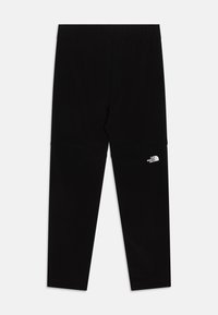 Mustat leggingsit, jotka on valmistettu joustavasta ja kevyestä materiaalista. Niissä on joustava vyötärönauha ja pieni valkoinen logo vasemmassa alareunassa.