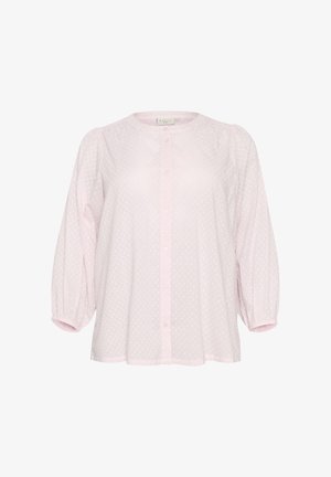 Blusa rosa chiaro con maniche a sbuffo, scollatura arrotondata, chiusura con bottoni e motivo a pois. Realizzata in tessuto leggero e semitrasparente.