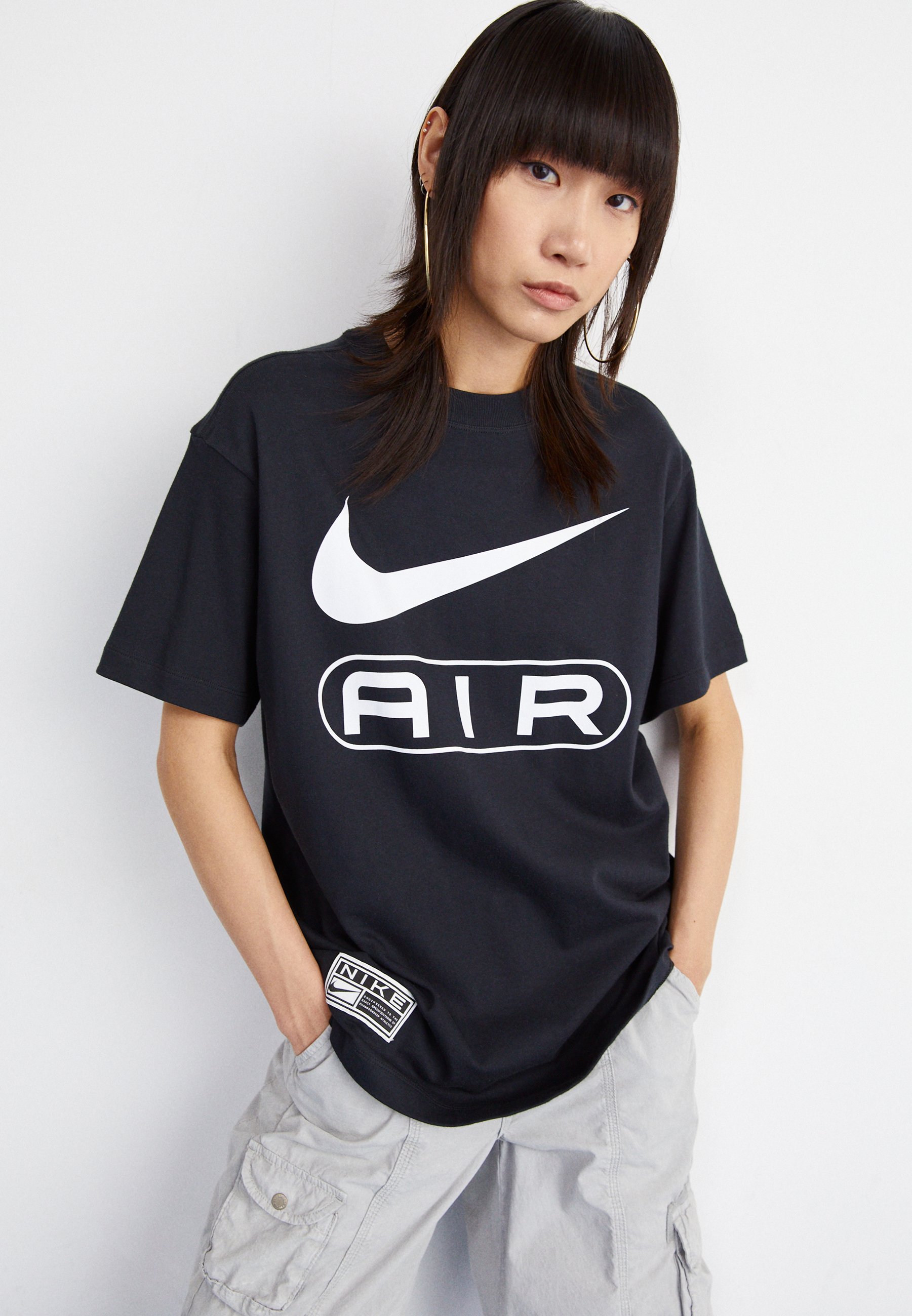 gray and black nike shirt