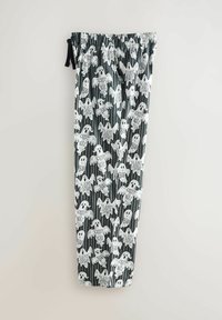 Ghost-patterned pajama pants featuring a black and white design with playful text. Made of soft fabric, with an elastic waistband.