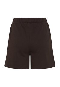Shorts noirs unis à taille élastique avec un design simple, montrés de dos sur fond blanc.