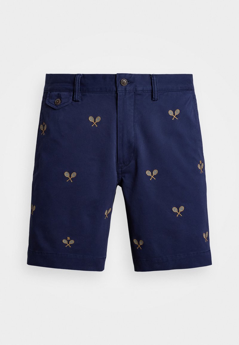 Marineblå bomullsshorts med spredte gullbroderte tenniskøller, knappelukking, standard lommer og rett ben-design.