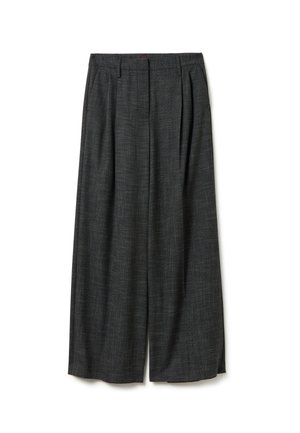 Pantalons larges en tissu gris foncé avec un motif subtil, dotés de plis à l'avant et d'une coupe ample pour un confort optimal.