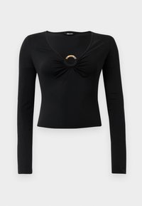 Black long-sleeve top with a V-neck, featuring gathered fabric at the bust and a round metallic accent in the center. Soft, stretchy material.