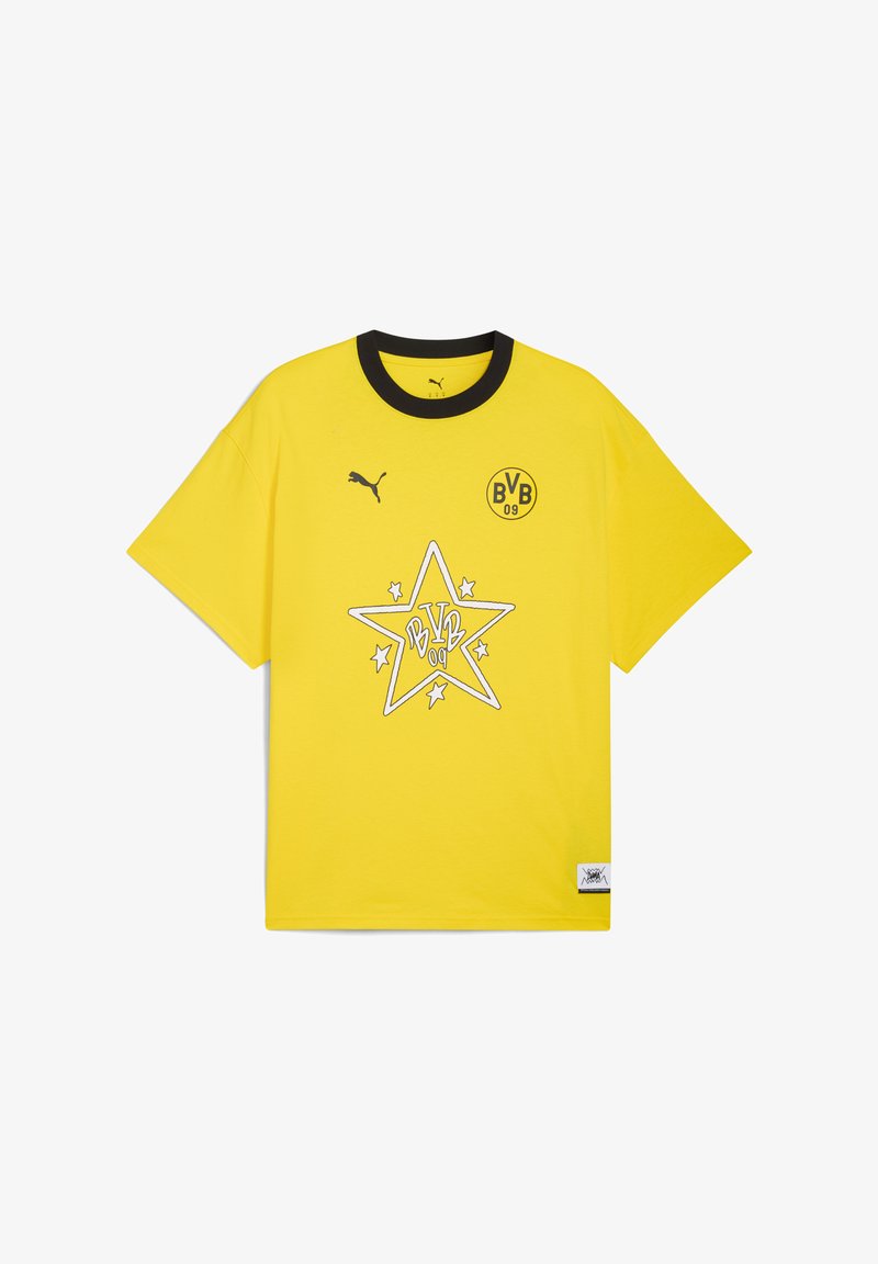 Gul bomullströja med svart krage, med en stjärn grafik och 'BVB 09' logotyp. Korta ärmar, avslappnad passform, texturerad tyger.