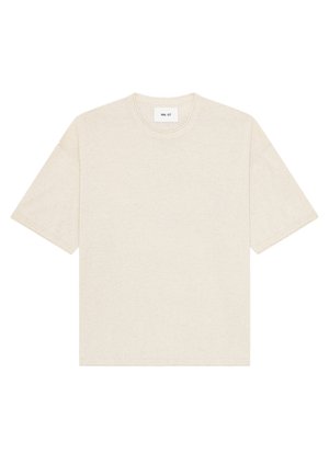 Beige katoenen T-shirt met korte mouwen, een ronde hals en een klein wit label aan de binnenkant van de kraag met de tekst "NN. 07".