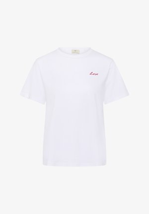 T-shirt blanc à manches courtes et col rond avec un petit texte brodé en rouge "Love" sur la poitrine gauche.