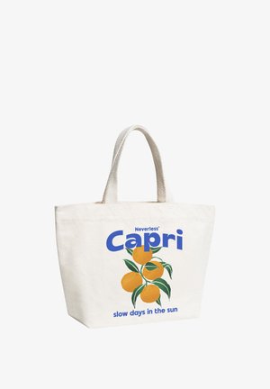 White tote bag with handles, featuring text "Neverless Capri" and "slow days in the sun" alongside illustration of orange fruits with green leaves.