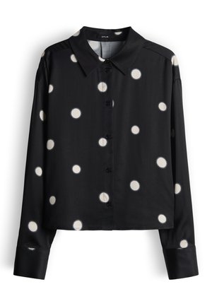 Zwart langarig shirt met witte stippen, voorzien van een kraag en een knoopsluiting aan de voorkant, gemaakt van een gladde stof met een losse pasvorm.