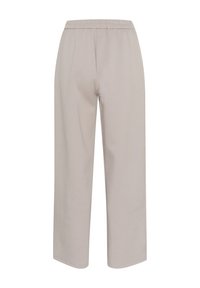 Lys beige, brede bukser med elastisk talje. Lavet af blødt stof, med en glat tekstur og lige snit.