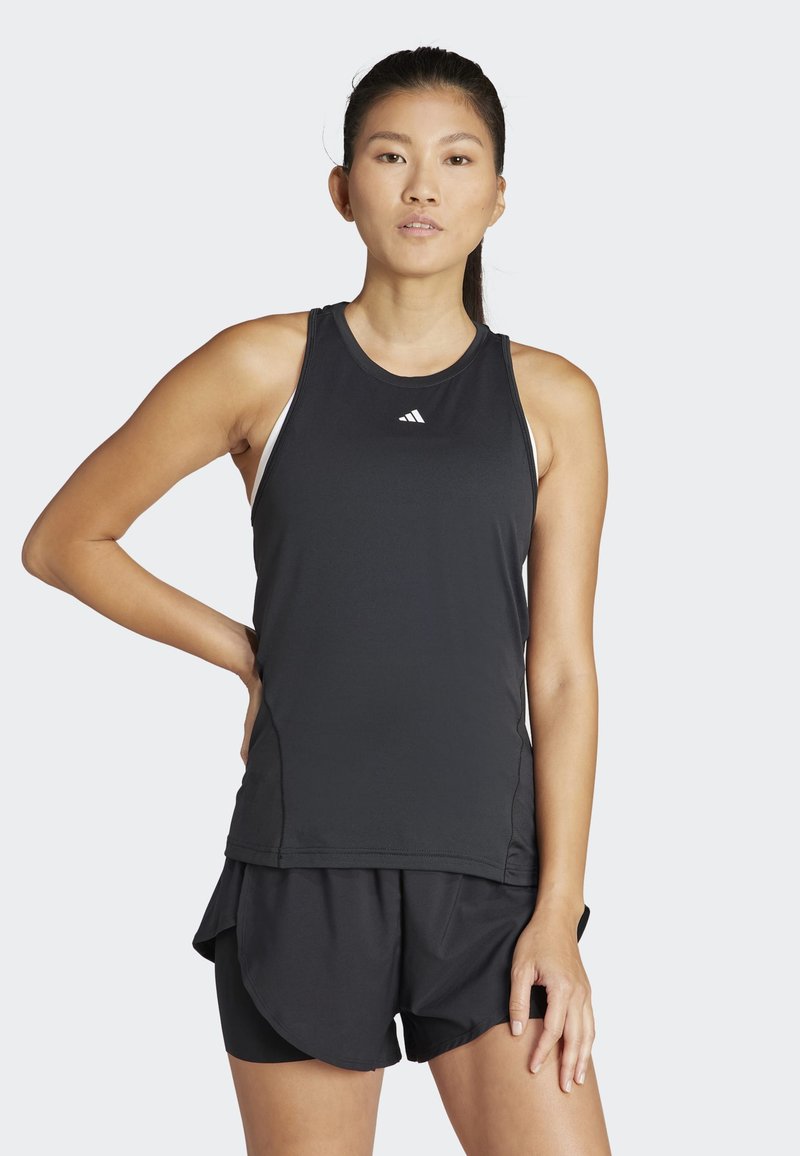 Black athletic tank top featuring a round neckline and side panels, paired with lightweight black shorts with a layered design.