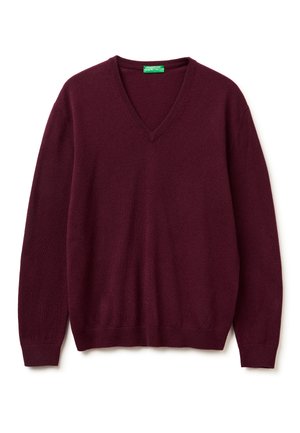 Suéter burdeos de cuello en V, hecho de una tela suave y texturizada, con mangas largas y puños acanalados. Diseño ligero, adecuado para combinar en capas.